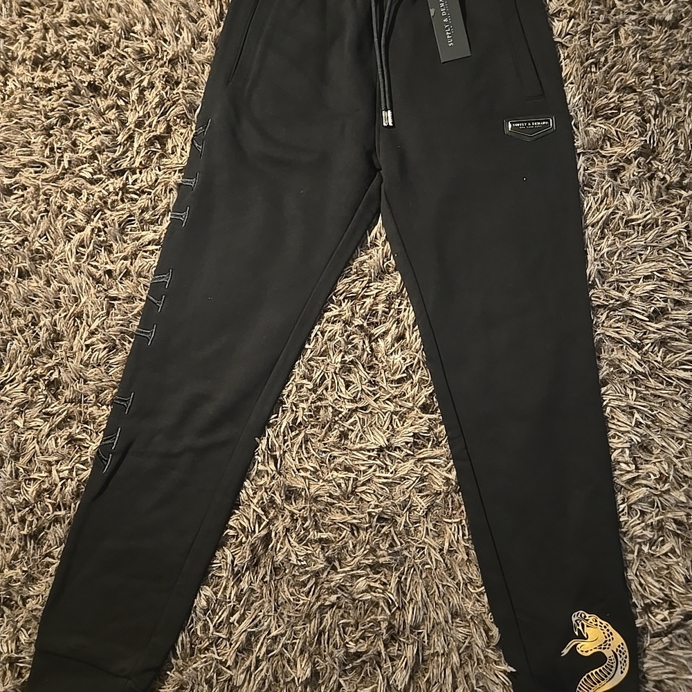 Black Jogger Pants with Snake Detail